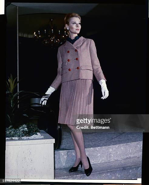 Pleated trend...Marking the pleated skirt trend shown by the great Norman Norell of New York is this suit ensemble from his Spring 1964 collection....