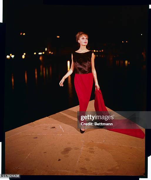 Spotlight at evening...Spotlighted by night on a bridge on the River Arno, with the famous Ponte Vecchio in the background...This Forquet creation...