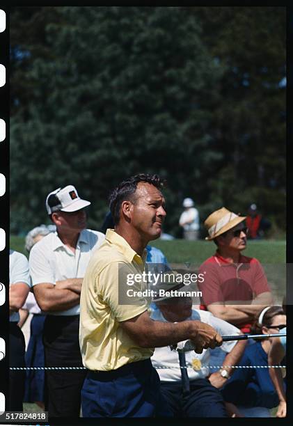 Augusta, Ga.: Arnold Palmer drives from the 8th tee in the second round of the Masters Tournament at the Augusta National Golf Course today.