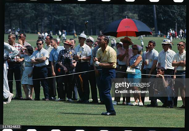 Augusta, Ga.: Arnold Palmer drives from the 8th tee in the second round of the Masters Tournament at the Augusta National Golf Course today.