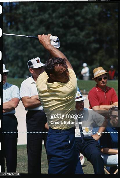 Augusta, Ga.: Arnold Palmer drives from the 8th tee in the second round of the Masters Tournament at the Augusta National Golf Course today.