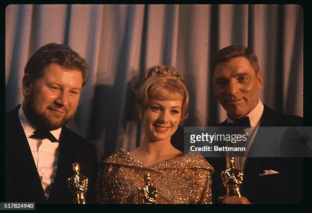 Oscar winners Peter Ustinov, Shirley Jones and Burt Lancaster with Oscars after winning best supporting actor, best actor respectively.