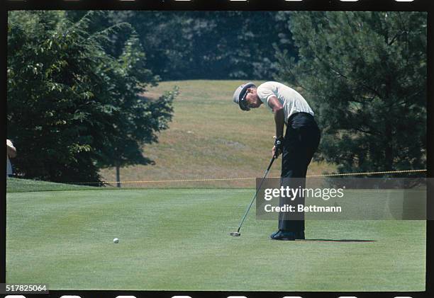 Harrison, N.Y.: Juan "Chi-Chi" Rodriguez lines up a putt on 4th Green during July 29th first round of Thunderbird Golf Tourney at Westchester Country...