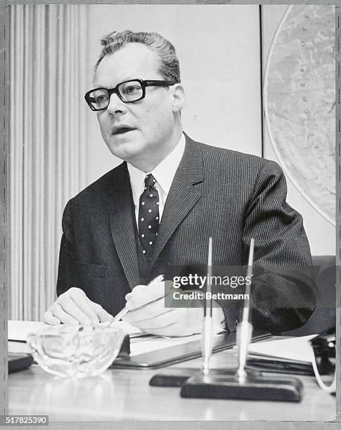 First day...Willy Brandt, leader of West Germany's Social Democratic Party , sits behind his desk as he took up his new post of Foreign Minister and...