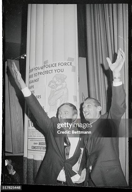 Conservative Party gubernatorial candidate Paul L. Adams, , and William F. Buckley Jr. Wave to the crowd during a rally held here. Adams said his...