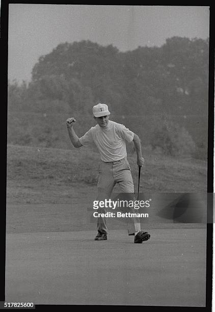 Bobby Cole of Springs, Trensvaal, South Africa, attempts to add a little strength to his putt on the 5th green, by shaking his first 9/1, in the...