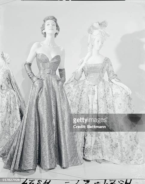 These comparisons between the ultrasmart evening gowns of today and those worn by the well dressed lady of fashion a century or more ago were made in...