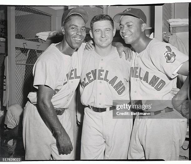 Laughing it up in the dressing room after their victory over the Yanks at the stadium tonight are from left Indians' Al Smith, left fielder who hit a...