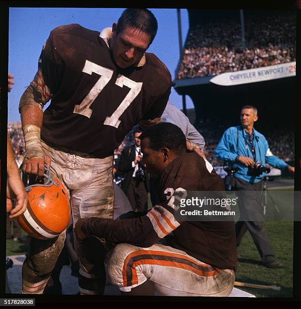 Cleveland, Ohio: Jim Brown of the Cleveland Browns coming off field in third quarter of game against Eagles. Brown set ground gain record in this...
