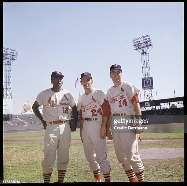 St. Louis, Mo.: Cardinals Bill White, left, Dick Groat, and Ken Boyer, right, at Busch Stadium.