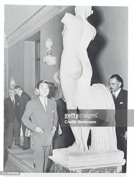 Akihito Meets Venus in Rome Museum. Rome, Italy: Prince Akihito, heir to the Japanese throne, appears unimpressed here by the statue of Venus in a...