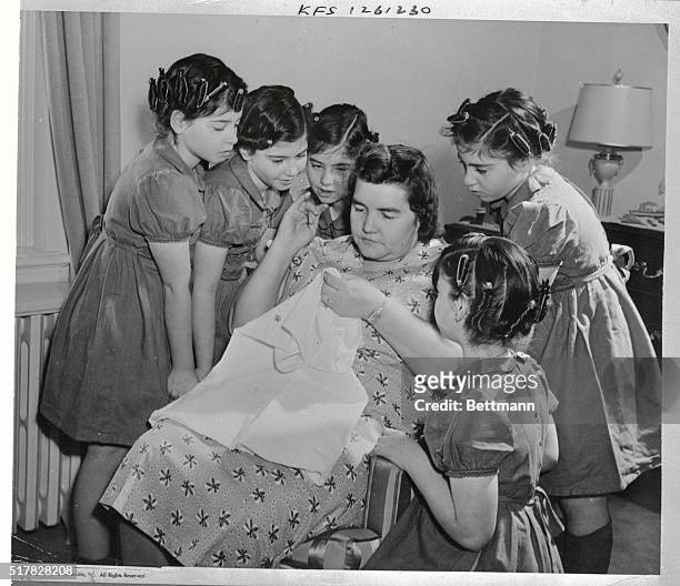 Emilie Dionne, one of the famous quintuplets, died suddenly of a stroke at a St. Agathe convent today. Here Emilie is shown at the extreme right with...