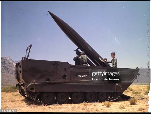 Preparing Lance Missile for firing from self-propelled launcher, White Sands Missile Range.