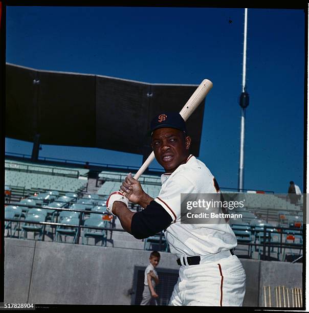 This photo shows Willie Mays of the San Francisco Giants batting at spring training camp in Arizona.