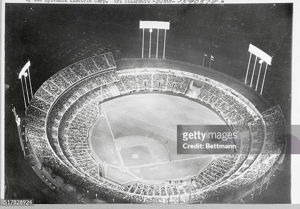 Sold out, the Oakland Alameda County Coliseum is jammed here with 50,000 fans, as play gets under way in the first baseball game ever played between...