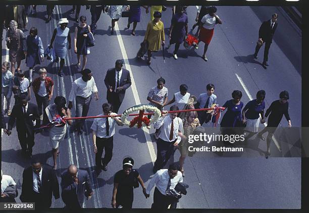 Atlanta, Georgia: General views, thousands of mourners walk the five mile route through Atlanta streets to Morehouse College where another service...