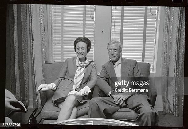 Attuned to the attention they have consistently received from the press, the Duke and Duchess of Windsor appear relaxed and smiling as they chat with...