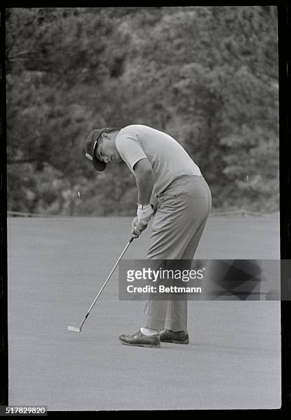 Rochester, New York: Lee Trevino sinking a 10 ft. Putt for a birdie at the 2nd hole in first round of U. S. Open at Oak Hill Country Club.