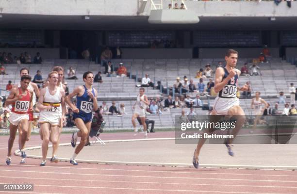 Mexico City, Mexico: Jim Ryan of Wichita, Ks. As he wins his qualifying heat in the 1500 meter run. Ryan, most observers though was coasting. His...