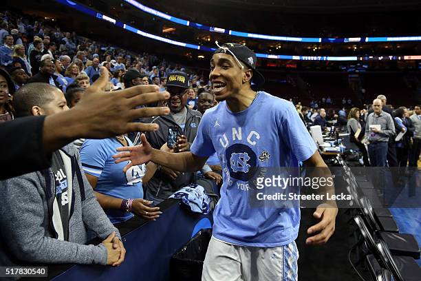 Brice Johnson of the North Carolina Tar Heels celebrates after defeating the Notre Dame Fighting Irish with a score of 74 to 88 in the 2016 NCAA...