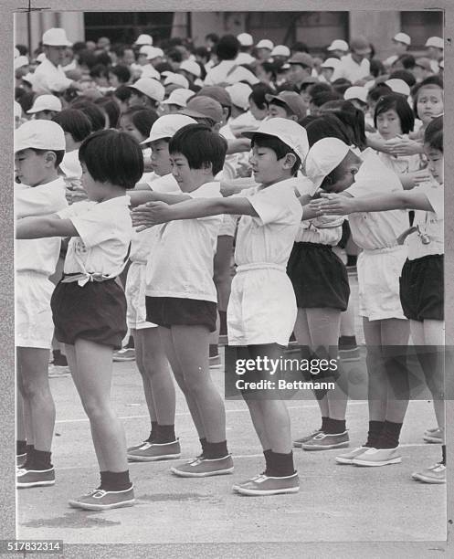 An Athletic Prince. Tokyo, Japan: Along with his school mates, Prince Hiro goes through gymnastic exercises during the Autumn Athletic Meet at the...