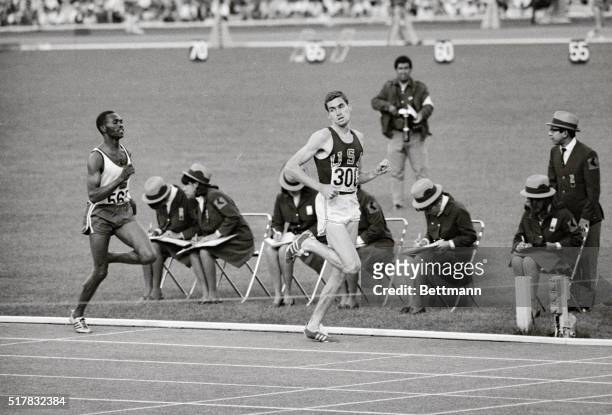 S Jim Ryun seems almost bored as he glances back to check his competition during the 1500 meter run semifinal 10/19. The man reckoned to be Ryan's...