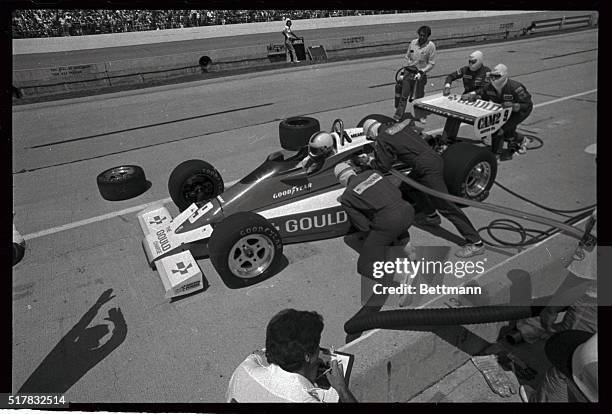 Indianapolis 500 pole-sitter Rick Mears takes a quick pit stop 5/27 for fuel in the first few laps of the 63rd annual running of the Indianapolis 500...