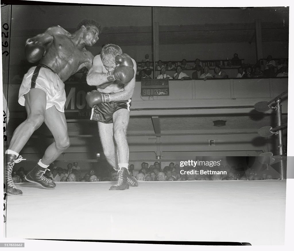 Floyd Patterson and Jacques Royer Fighting