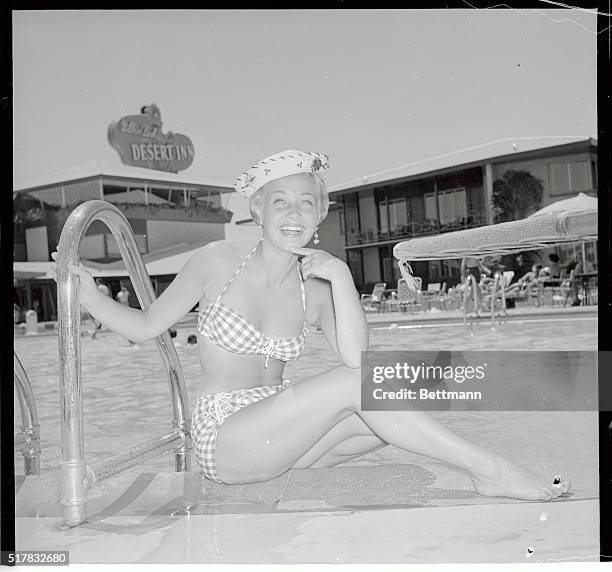 Lovely Jane Powell is a picture of beauty and health as she poses at Wilbur Clark's Desert Inn, Las Vegas, where she is on vacation.