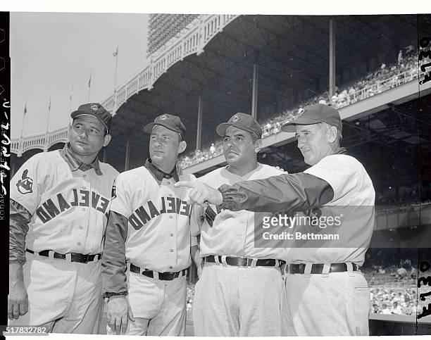 Manager Al Lopez of the Cleveland Indians is shown with his three star hurlers : Mike Garcia, Bob Lemon, and Early Wynn. Wynn made the New York...