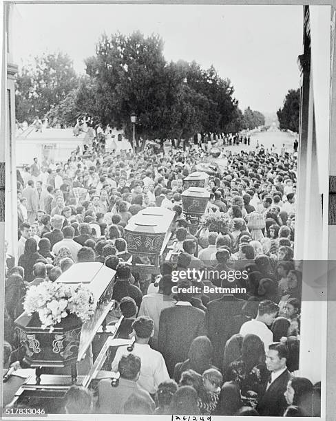 This is a long line of coffins as the victims of the Cadet uprising are given a state funeral by the Guatemalan people.