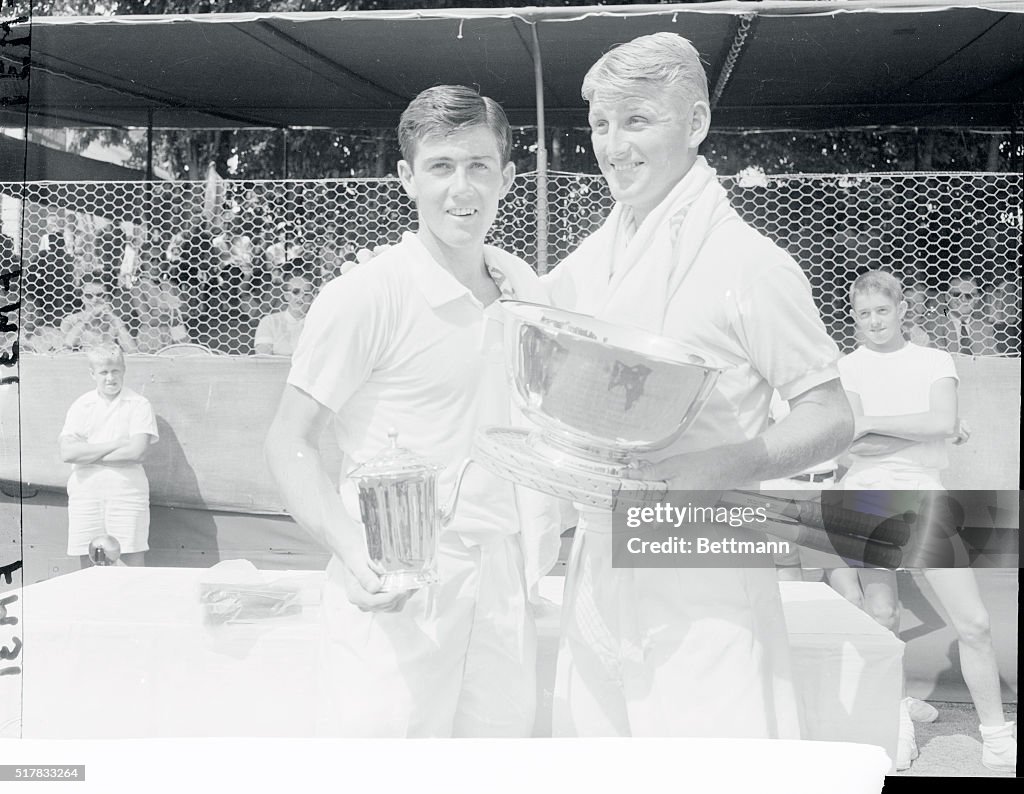 Lewis Hoad Holding a Winner's Trophy