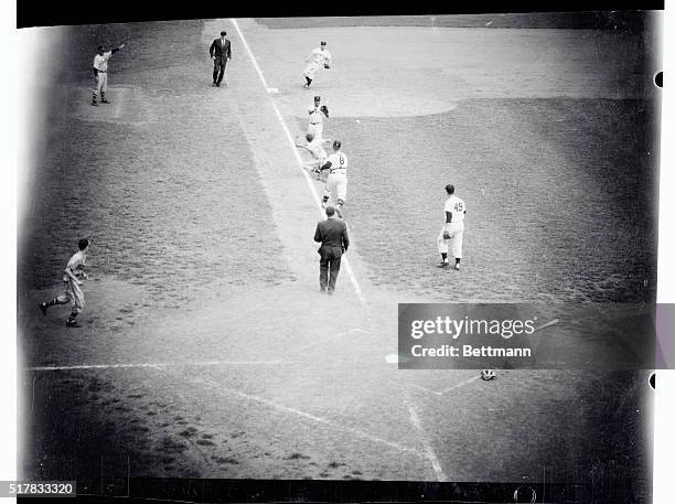 Bill Bruton of the Braves is shown as he was caught in a rundown between third and home in the 9th inning of today's game with the Giants at the Polo...