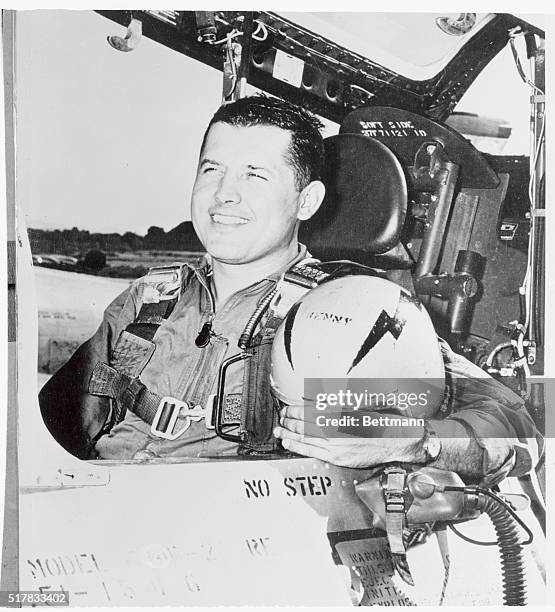 Shown in the cockpit of his F-84-F Thunderstorm is Captain Edward W. Kenny, USAF, of Glendale, Arizona, who jet streaked from California to Ohio...