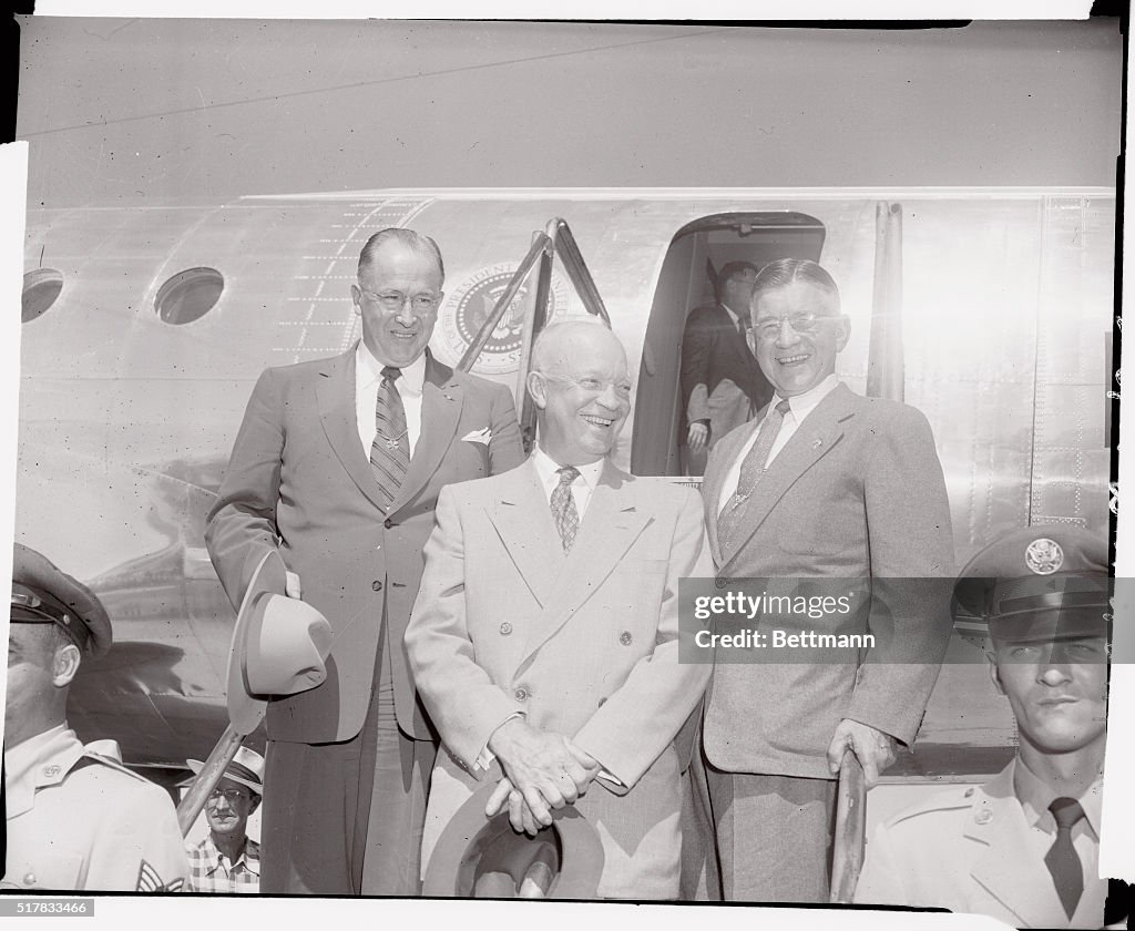 Dwight D. Eisenhower and Party Standing Near Airplane