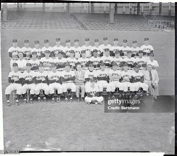 The New York Giants, champions of the National League who meet the Cleveland Indians for the World Series pennant next week, are shown as they posed...