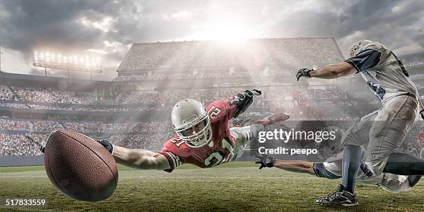 american football touchdown - touchdown stock-fotos und bilder