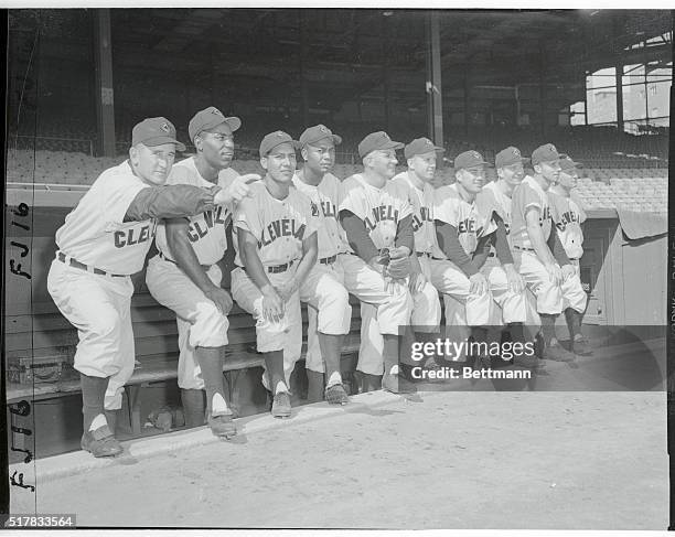 Manager Al Lopez poses with his starting lineup for tomorrow's World Series opening game prior to a workout today at the Polo Grounds. Left to right:...