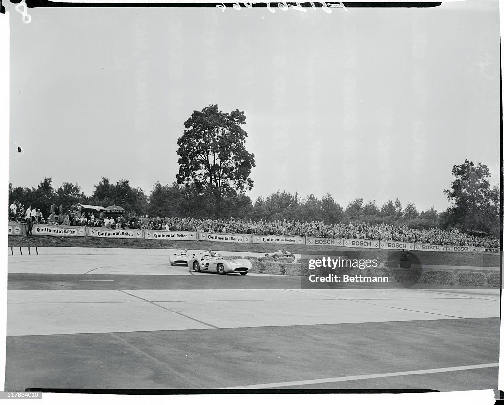 Juan M. Fangio and Karl Kling Racing in a Grand Prix