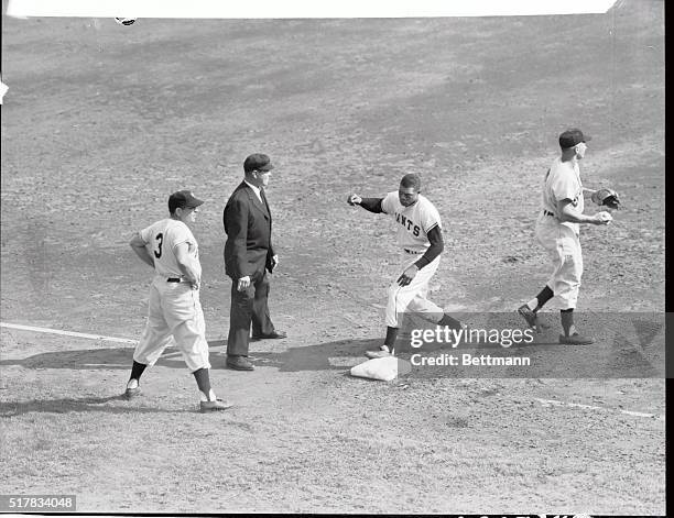 Willie Mays, who should really have the thing glued on, ran out from under his cap as usual in the big third inning of the World series opener...