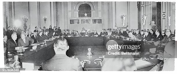 This is a striking round-the-table view of the delegates to the Nine Power Conference in London busy at work in Lancaster House. At the extreme left...