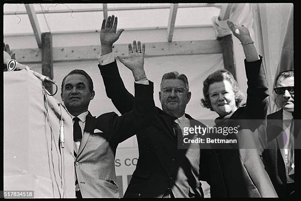 Third party presidential candidate George C. Wallace and his running mate General Curtis E. LeMay wave to an estimated crowd of 5,000 persons during...