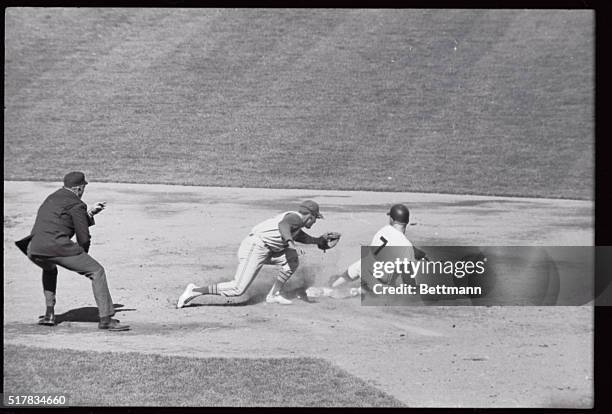 New York Yankee's Mickey Mantle steals second as the Oakland Athletic's shortstop Bert Campaneris covers the bag in the third inning of a game at New...