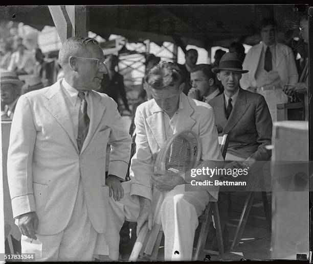 Donald Budge, American Davis Cup star, rather downcast after his fellow-player, Wilmer Allison, had 4-6, 6-2, 6-2 in the deciding victory in the...