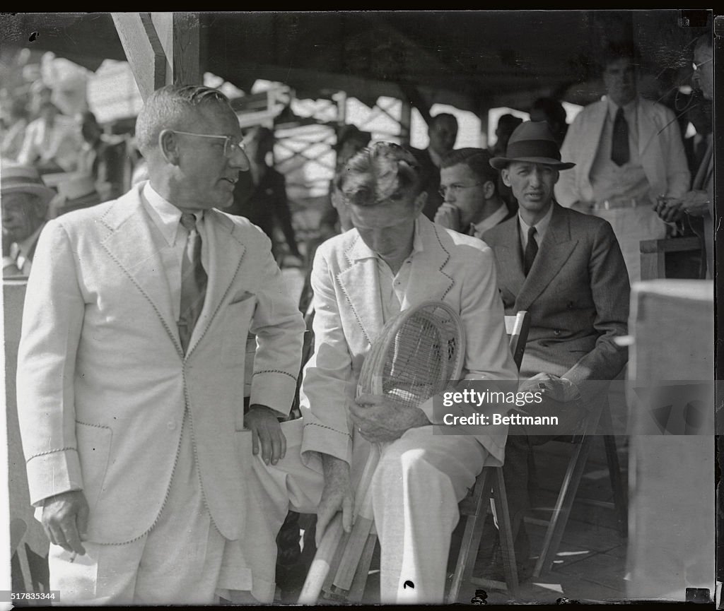 Walter Pate Talking to Saddened Donald Budge