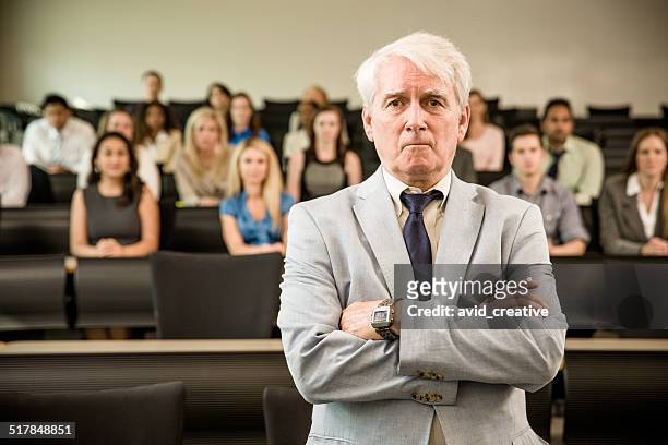 senior professor in front of college students - suit and tie stock pictures, royalty-free photos & images