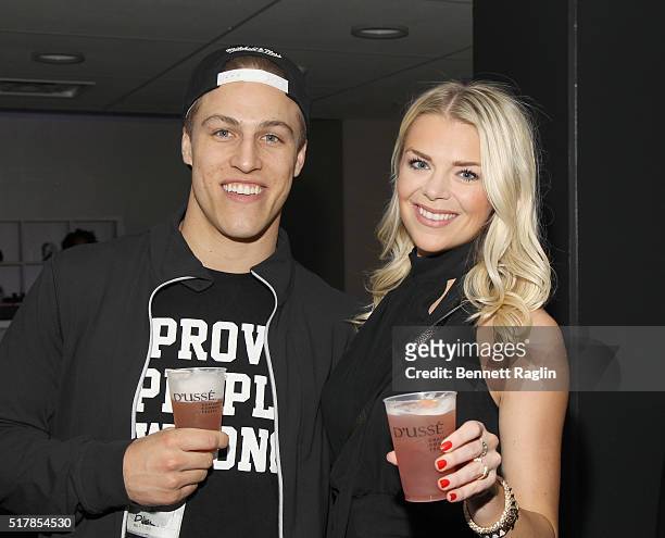 Professional hockey player Anders Lee and Grace Dooley attends D'USSE VIP Riser At Rihanna: ANTI World Tour at Barclays Center on March 27, 2016 in...