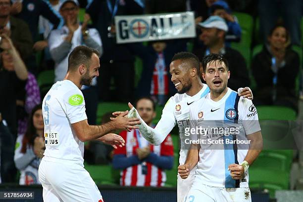 Harry Novillo of City FC celebrates with Bruno Fornaroli and Ivan Franjic after scoring the first goal during the round 25 A-League match between...