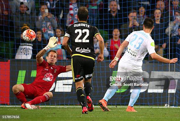 Bruno Fornaroli of City FC beats goalkeeper Glen Moss of the Phoenix to score the second goal during the round 25 A-League match between Melbourne...