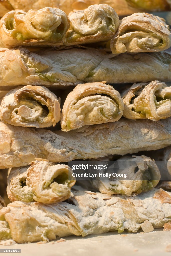 Fresh apple pastries stacked in pile